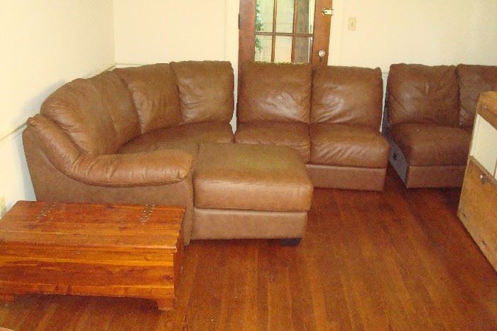 Leather sectional and cedar chest.