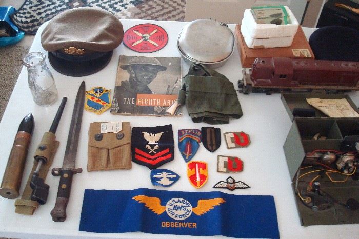 Bayonets, patches, hat & other military items.