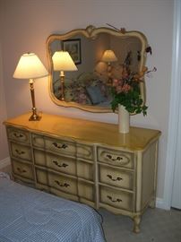 Matching dresser and mirror with more table top lamps.