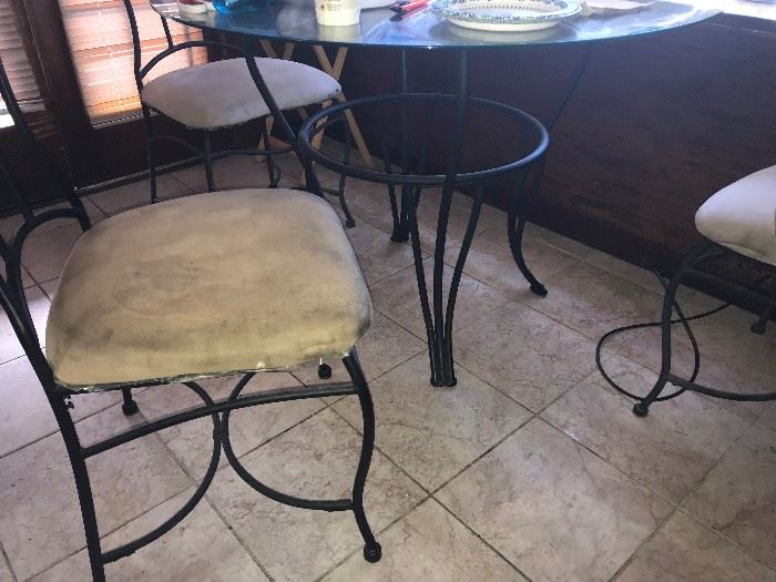 Wrought iron and glass bistro table