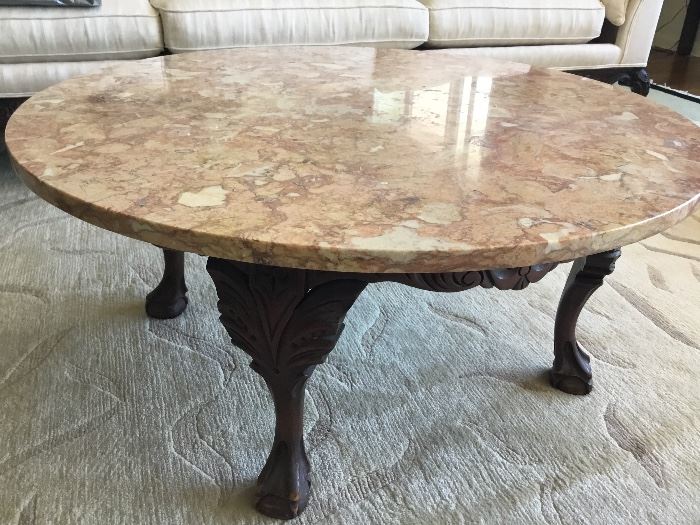 Marble coffee table with carved legs $400