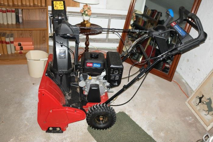 Toro gas powered 4 cycle snow blower.  Very little use.