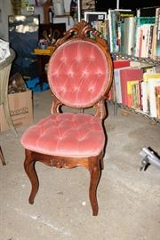 Tufted Hand Carved Antique Chair.  