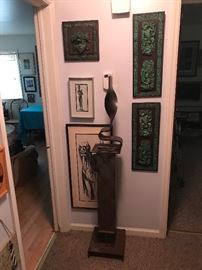 Metal sculpture and more signed and numbered art work thru-out the house!