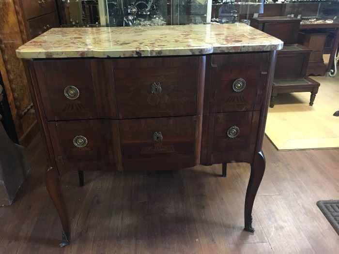 HV. French Commode Sauteuse with marquetry, parquetry, and breccia marble top. 19th-century.