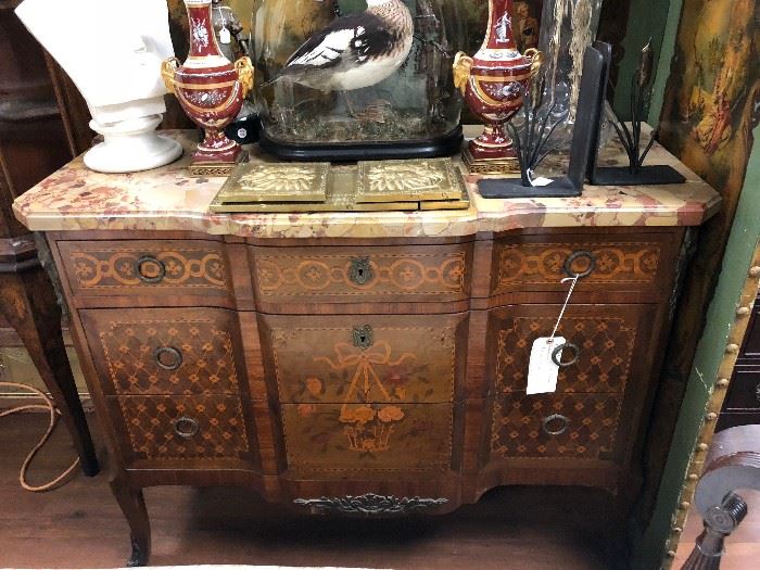 HV. French Louis XVI Style Commode with marquetry and breccia marble top. Circa 19th century.