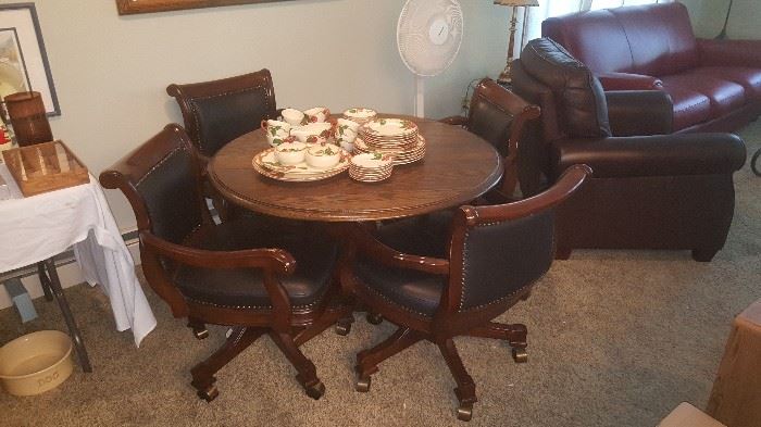 Game Table with Leather Chairs