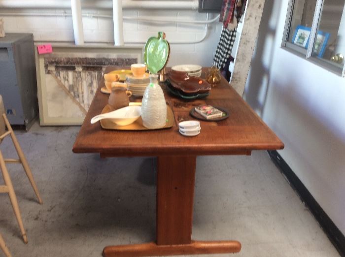 Teak dining table with pottery inlay