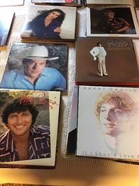 Many, many albums. Could use some for frisbees, make clocks or bowls