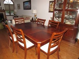 $900. This Dining Room Table and matching China Cabinet is gorgeous. Purchased from Carson's for over $3000 it is solid cherry wood with the chairs being upholstered in a light ivory. The wood is in beautiful condition. No crazing or cracking. Always maintained and cared for. The Dining Room table comes with 6 chairs. The matching china cabinet has 3 glass shelves for displaying your china and space under neath for storing your serving sets and 2 drawers for silver ware. There is a small break in one of the chairs which can easily be fixed and 1 small spot in the upholstery of two of the chairs. Please see pictures. The price reflects these flaws. The owners are firm on the price. In Tinley Park. Please text me for questions or to make an appointment to see it. Melanie 708-270-8064