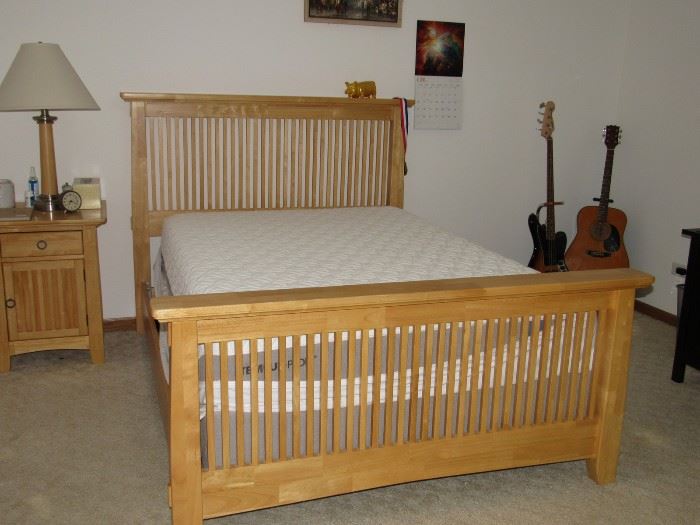 $450. This bed is gorgeous and made of solid White Oak Wood. In the Mission style with slat headboard and foot board. Timeless and classy. This bed will last you forever. It was bought from Carson's and has been used in a guest bedroom so it is like new. It is a full size. It has no flaws what so ever. They paid about $1600 for this set. Comes with the night stand. Does not come with the mattress. In Tinley Park. You can text me at Melanie at 708-270-8064