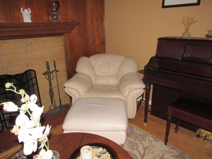 Big cozy chair with ottoman included with couch. Great condition.