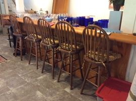  Set of five swivel barstools with cushions