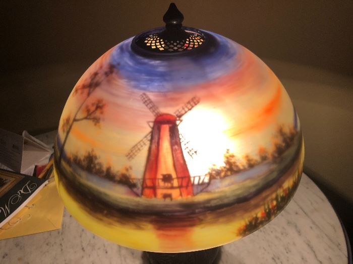 CLOSER VIEW OF WINDMILL REVERSE PAINTED GLASS SHADE WITH ORNATE TABLE BASE