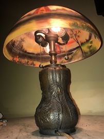 CLOSE UP UNDER VIEW OF THIS REVERSE PAINTED WINDMILL PAINTED GLASS SHADE