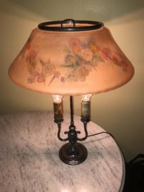 ANOTHER VIEW OF THIS SIGNED PAIRPOINT TABLE LAMP WITH FLORAL REVERSE PAINTED SHADE CIRCA 1920'S.