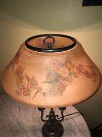 ANOTHER VIEW OF THIS SIGNED PAIRPOINT TABLE LAMP WITH FLORAL REVERSE PAINTED SHADE CIRCA 1920'S.