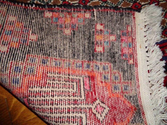 CLOSE UP VIEW OF THE WEAVE AND THIS PERSIAN HAND WOVEN WIDE FLOOR RUNNER