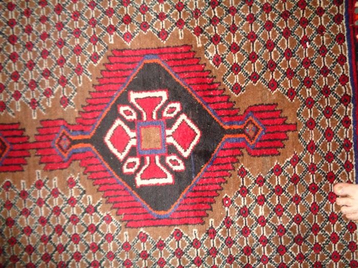 CLOSE UP VIEW OF IRANIAN PERSIAN HAND WOVEN