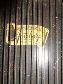 CLOSE UP VIEW OF SIGNATURE MUSICAL INSTRUMENT ANTIQUE HARPS ACCORD