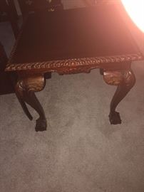 CLOSE UP VIEW OF CHIPPENDALE HIGHLY CARVE BALL AND CLAW MAHOGANY COCKTAIL TABLE
