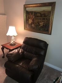 SITTING ROOM VIEW OF ANTIQUE OIL PAINTING ON BOARD, CHIPPENDALE TABLE AND LAZY BOY RECLINER