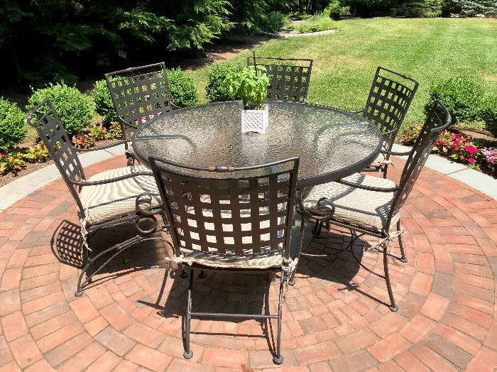 Woodard Sheffield: Squared lattice backs and curled wrought iron arms. Custom Cushions. Woodard Table with obscure glass.