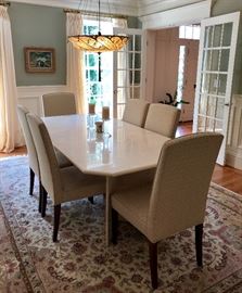 Marble top contemporary dining table and 6 upholstered parsons dining chairs