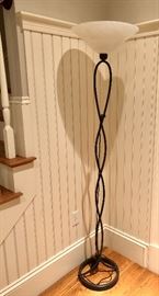 Wrought iron floor lamp with glass shade