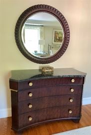 Henredon marble top 4-drawer dresser. Round mirror above.