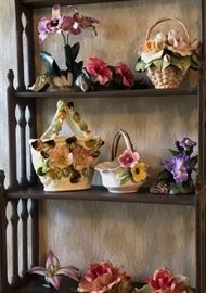 Majolica and capodimonte style flowers. Wall shelf.