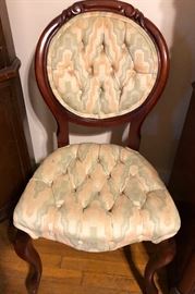 Pair of tufted upholstered chairs
