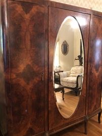 Double armoire, burled wood, oval mirror. Great for your dressing room or walk in closet.