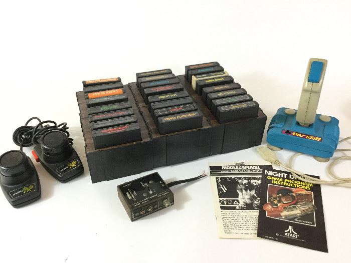 Atari Games and Controllers   http://www.ctonlineauctions.com/detail.asp?id=738877