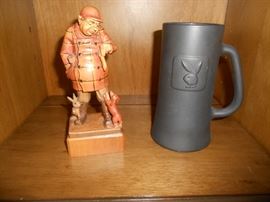 Carved wood hunting figure and Play boy mug