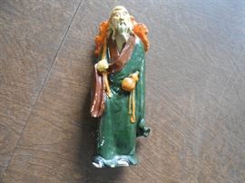 Approx 7" painted `mud man'?
