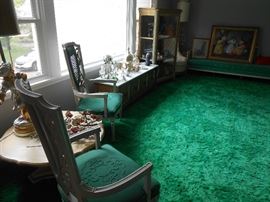 Hi-back caned arm chairs with raised motifs center seat