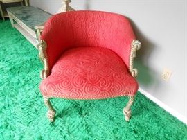 Orange raised decorative fabric - accented with knotted legs and arms - very unique chair!