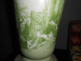 2 hunters during the winter snow fall in front of a castle