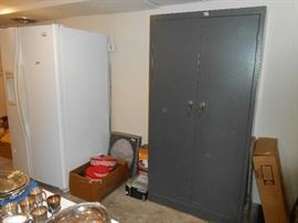 Fridge and 2 door metal cabinet