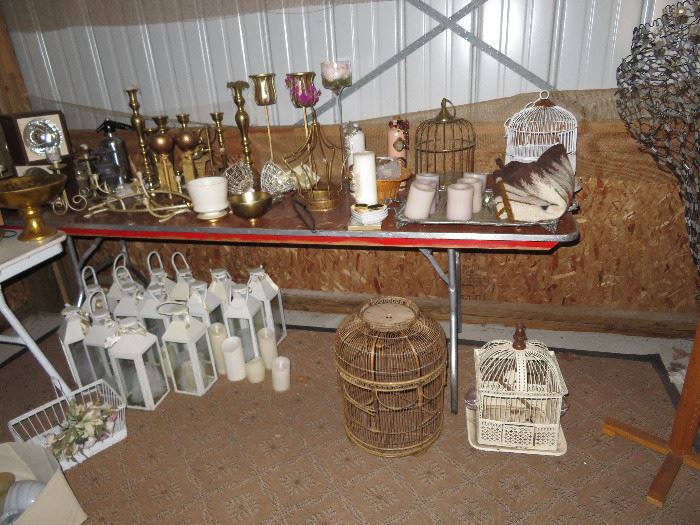 Lanterns, bird cages, brass candle sticks, vintage dress form