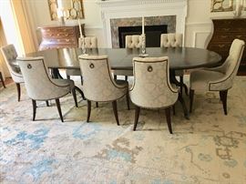 Dining Room featuring Thomas Pheasant/Baker dining chairs finished in  Cowtan & Tout and Traverse fabric.  Dessin Fournin Double Pedestal Georgian Dining Table, and Baker Chests. Rug currently NOT INCLUDED IN SALE.