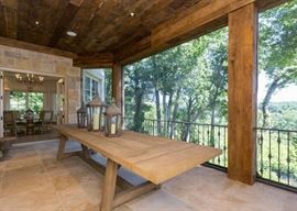 This HEAVY, wood table is 10 feet long and 41 inches deep