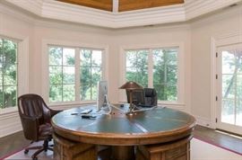 Guy Chaddock pedestal office table with custom Leather top and movable drawers/file cabinets.