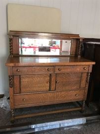 #107	Oak Antique Sideboard/Mirror Antique  54x24x40  mirror 16"Tx54	 $175.00 
