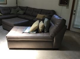 Matching grey leather lounging chair