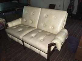 Funky vinyl couch.  also has 6 matching chairs