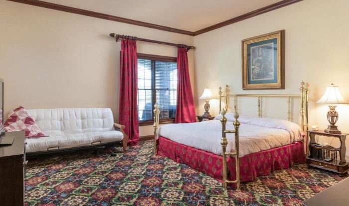 King Size Brass and Marble Bed with double brass posts on all four sides is located in the Guest Quarters downstairs. 