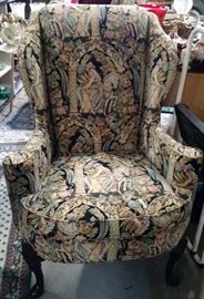 one of two identical Tapestry Fireplace Chairs both have matching Footstools. 