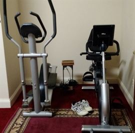 More exercise equipment, like new, in the gym area